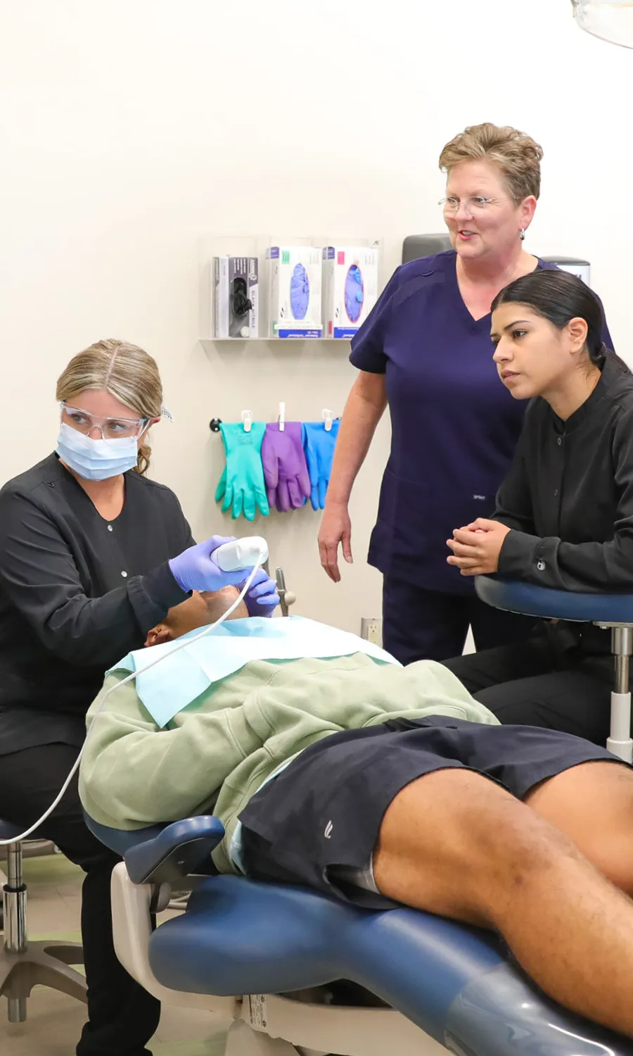 Hannah observing dental teacher