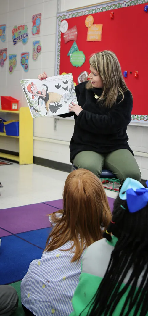 Teacher with small children